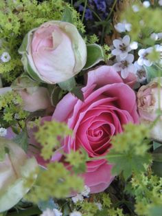 Close up of bouquet with pinks and greens